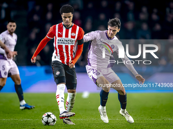 PSV Eindhoven midfielder Malik Tillman and Girona FC midfielder Silvi Clua play during the match between PSV and Girona at the Philips Stadi...