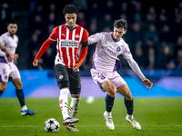 PSV Eindhoven midfielder Malik Tillman and Girona FC midfielder Silvi Clua play during the match between PSV and Girona at the Philips Stadi...