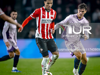 PSV Eindhoven midfielder Malik Tillman and Girona FC midfielder Silvi Clua play during the match between PSV and Girona at the Philips Stadi...