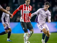 PSV Eindhoven midfielder Malik Tillman and Girona FC midfielder Silvi Clua play during the match between PSV and Girona at the Philips Stadi...