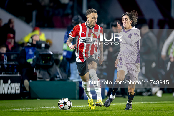 PSV Eindhoven forward Noa Lang and Girona FC forward Bryan Gil play during the match between PSV and Girona at the Philips Stadium for the U...