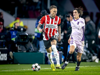 PSV Eindhoven forward Noa Lang and Girona FC forward Bryan Gil play during the match between PSV and Girona at the Philips Stadium for the U...