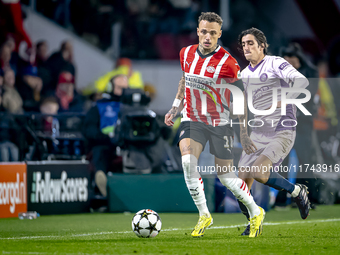 PSV Eindhoven forward Noa Lang and Girona FC forward Bryan Gil play during the match between PSV and Girona at the Philips Stadium for the U...