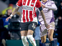 PSV Eindhoven forward Noa Lang and Girona FC forward Bryan Gil play during the match between PSV and Girona at the Philips Stadium for the U...