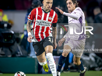 PSV Eindhoven forward Noa Lang and Girona FC forward Bryan Gil play during the match between PSV and Girona at the Philips Stadium for the U...