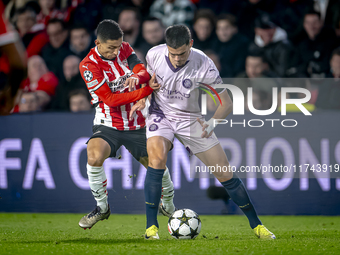 PSV Eindhoven defender Mauro Junior and Girona FC defender Miguel Gutierrez play during the match between PSV and Girona at the Philips Stad...