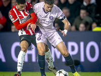 PSV Eindhoven defender Mauro Junior and Girona FC defender Miguel Gutierrez play during the match between PSV and Girona at the Philips Stad...