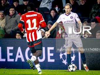 Girona FC defender Daley Blind plays during the match between PSV and Girona at the Philips Stadium for the UEFA Champions League - League p...