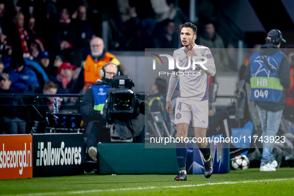 Girona FC defender Arnau Martinez receives a red card and leaves the pitch during the match between PSV and Girona at the Philips Stadium fo...