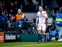 Girona FC defender Arnau Martinez receives a red card and leaves the pitch during the match between PSV and Girona at the Philips Stadium fo...