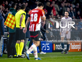 Girona FC defender Arnau Martinez receives a red card and leaves the pitch during the match between PSV and Girona at the Philips Stadium fo...