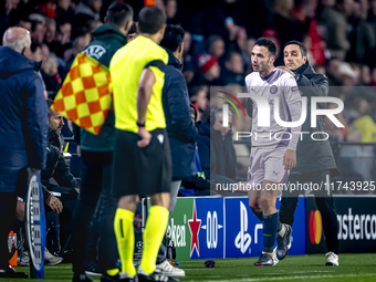 Girona FC defender Arnau Martinez receives a red card and leaves the pitch during the match between PSV and Girona at the Philips Stadium fo...