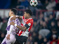 Girona FC forward Bojan Miovski and PSV Eindhoven defender Ryan Flamingo play during the match between PSV and Girona at the Philips Stadium...