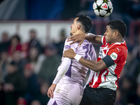 Girona FC forward Bojan Miovski and PSV Eindhoven defender Ryan Flamingo play during the match between PSV and Girona at the Philips Stadium...