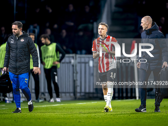 PSV Eindhoven forward Noa Lang becomes injured and leaves the pitch during the match between PSV and Girona at the Philips Stadium for the U...