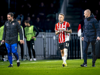 PSV Eindhoven forward Noa Lang becomes injured and leaves the pitch during the match between PSV and Girona at the Philips Stadium for the U...