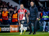 PSV Eindhoven forward Noa Lang becomes injured and leaves the pitch during the match between PSV and Girona at the Philips Stadium for the U...