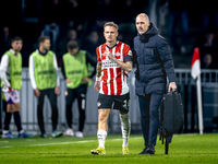 PSV Eindhoven forward Noa Lang becomes injured and leaves the pitch during the match between PSV and Girona at the Philips Stadium for the U...