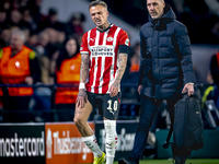 PSV Eindhoven forward Noa Lang becomes injured and leaves the pitch during the match between PSV and Girona at the Philips Stadium for the U...