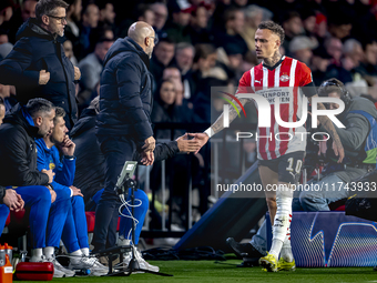 PSV Eindhoven forward Noa Lang becomes injured and leaves the pitch during the match between PSV and Girona at the Philips Stadium for the U...