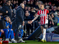 PSV Eindhoven forward Noa Lang becomes injured and leaves the pitch during the match between PSV and Girona at the Philips Stadium for the U...