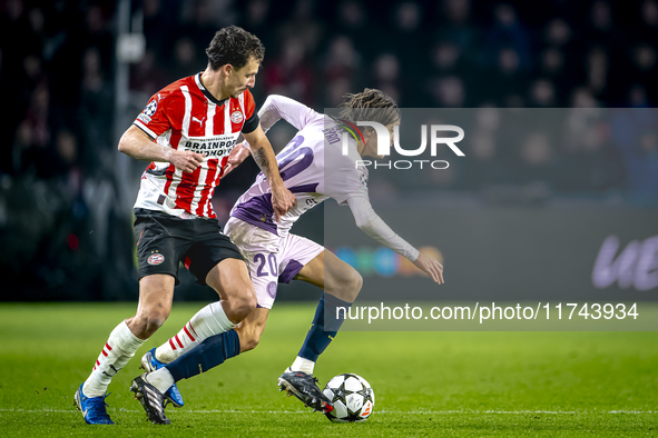 PSV Eindhoven defender Olivier Boscagli and Girona FC forward Bryan Gil play during the match between PSV and Girona at the Philips Stadium...