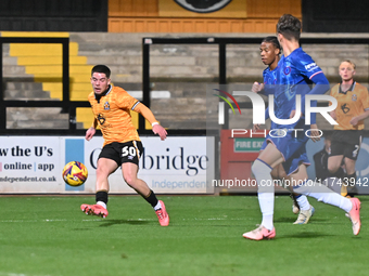 Glenn McConnell (30 Cambridge United) crosses the ball during the EFL Trophy match between Cambridge United and Chelsea Under 21s at the Cle...