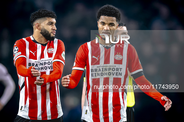 PSV Eindhoven midfielder Ismael Saibari and PSV Eindhoven midfielder Malik Tillman play during the match between PSV and Girona at the Phili...