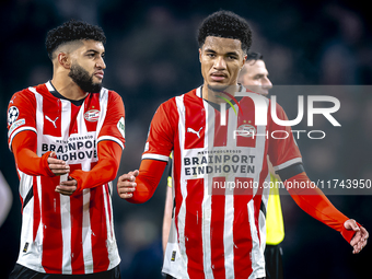 PSV Eindhoven midfielder Ismael Saibari and PSV Eindhoven midfielder Malik Tillman play during the match between PSV and Girona at the Phili...