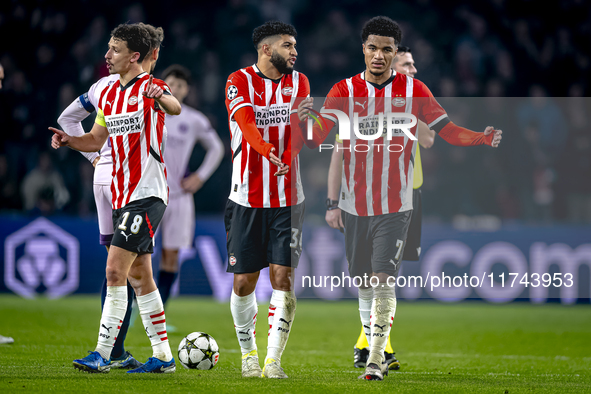 PSV Eindhoven midfielder Ismael Saibari and PSV Eindhoven midfielder Malik Tillman play during the match between PSV and Girona at the Phili...