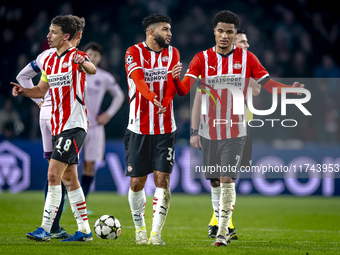 PSV Eindhoven midfielder Ismael Saibari and PSV Eindhoven midfielder Malik Tillman play during the match between PSV and Girona at the Phili...