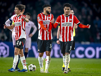 PSV Eindhoven midfielder Ismael Saibari and PSV Eindhoven midfielder Malik Tillman play during the match between PSV and Girona at the Phili...