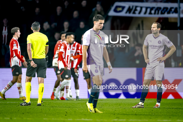 Girona FC defender Daley Blind appears dejected during the match between PSV and Girona at the Philips Stadium for the UEFA Champions League...