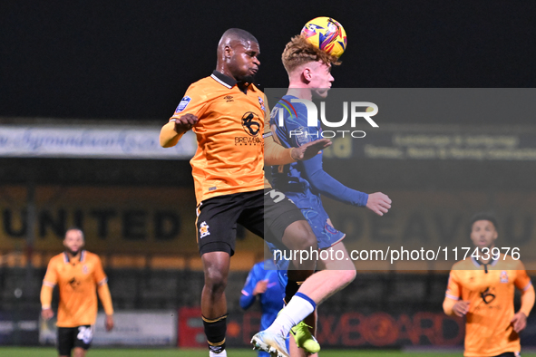 Amaru Kaunda (37, Cambridge United) challenges Brodie Hughes (44, Chelsea) during the EFL Trophy match between Cambridge United and Chelsea...