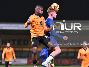 Amaru Kaunda (37, Cambridge United) challenges Brodie Hughes (44, Chelsea) during the EFL Trophy match between Cambridge United and Chelsea...