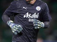 Ederson of Manchester City warms up before the UEFA Champions League match between Sporting CP and Manchester City at Jose Alvalade Stadium...