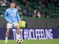 Phil Foden of Manchester City warms up before the UEFA Champions League match between Sporting CP and Manchester City at Jose Alvalade Stadi...