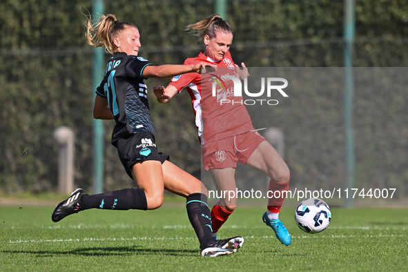 Federica D'Auria of S.S. Lazio and Mina Bergersen of F.C. Como Women participate in the round of 16 of the Coppa Italia Femminile between S....