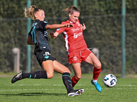 Federica D'Auria of S.S. Lazio and Mina Bergersen of F.C. Como Women participate in the round of 16 of the Coppa Italia Femminile between S....