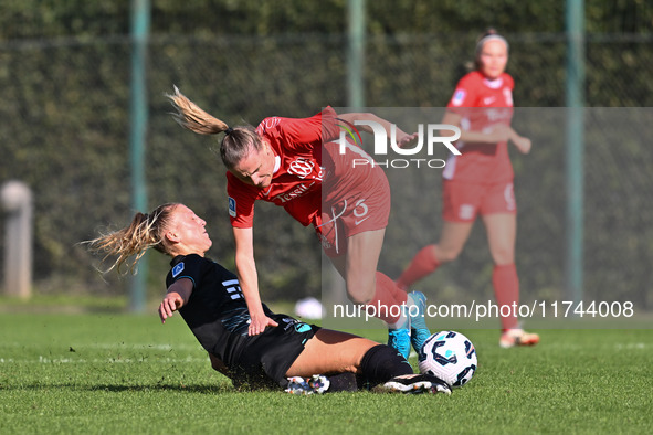 Federica D'Auria of S.S. Lazio and Mina Bergersen of F.C. Como Women participate in the round of 16 of the Coppa Italia Femminile between S....