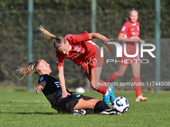 Federica D'Auria of S.S. Lazio and Mina Bergersen of F.C. Como Women participate in the round of 16 of the Coppa Italia Femminile between S....