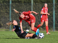 Federica D'Auria of S.S. Lazio and Mina Bergersen of F.C. Como Women participate in the round of 16 of the Coppa Italia Femminile between S....