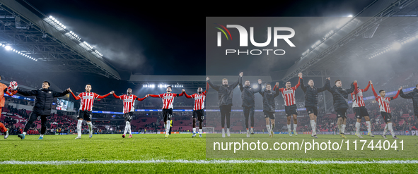 Players of PSV celebrate the victory after the game during the match between PSV and Girona at the Philips Stadium for the UEFA Champions Le...