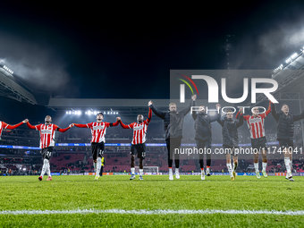 Players of PSV celebrate the victory after the game during the match between PSV and Girona at the Philips Stadium for the UEFA Champions Le...