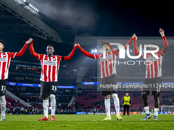 Players of PSV celebrate the victory after the game during the match between PSV and Girona at the Philips Stadium for the UEFA Champions Le...