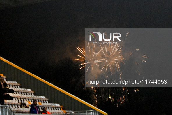 Fireworks occur outside the ground during the EFL Trophy match between Cambridge United and Chelsea Under 21s at the Cledara Abbey Stadium i...