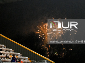 Fireworks occur outside the ground during the EFL Trophy match between Cambridge United and Chelsea Under 21s at the Cledara Abbey Stadium i...