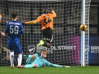 Goalkeeper Lucas Bergstrom (47 Chelsea) saves from Brandon Njoku (34 Cambridge United) during the EFL Trophy match between Cambridge United...