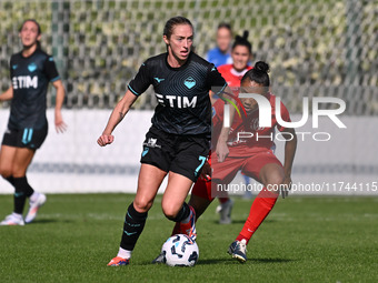 Megan Connolly of S.S. Lazio and Sarina Bolden of F.C. Como Women participate in the round of 16 of Coppa Italia Femminile between S.S. Lazi...