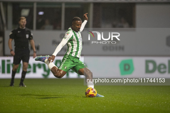 Richard Kone #24 of Wycombe Wanderers F.C. scores from the penalty spot, making the score 1-0, during the Sky Bet League 1 match between Sto...